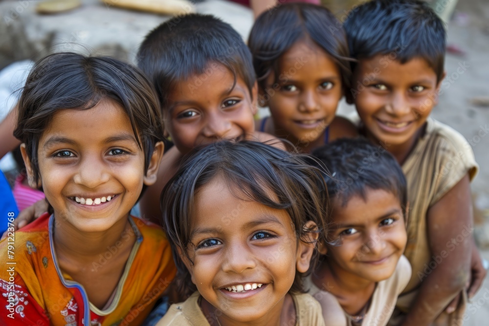 Group of indian kids smiling and looking at the camera in India Group of indian kids smiling and looking at the camera in India