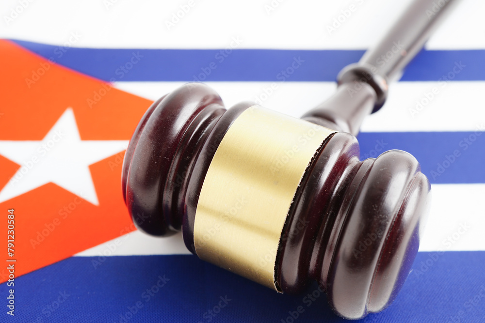 Cuba law, Legal, justice and agreement, wooden court gavel on flag. Cuba law, Legal, justice and agreement, wooden court gavel on flag.