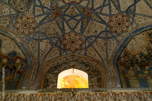 View through at the window of the ancient madrasah, Bukhara, Uzbekistan. photo