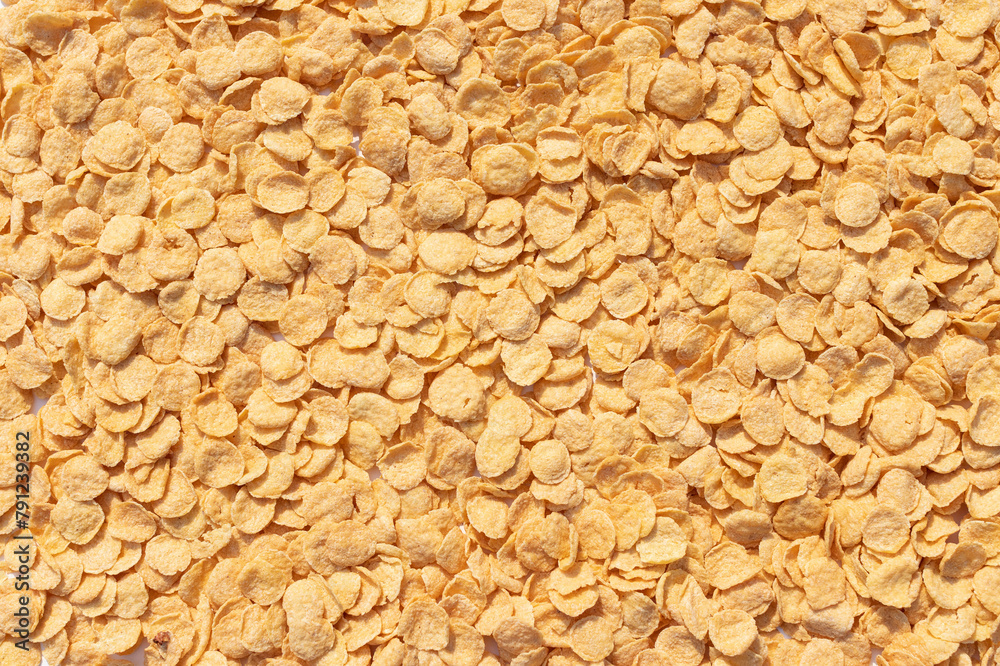 Natural yellow solid background of corn flakes Natural yellow solid background of corn flakes
