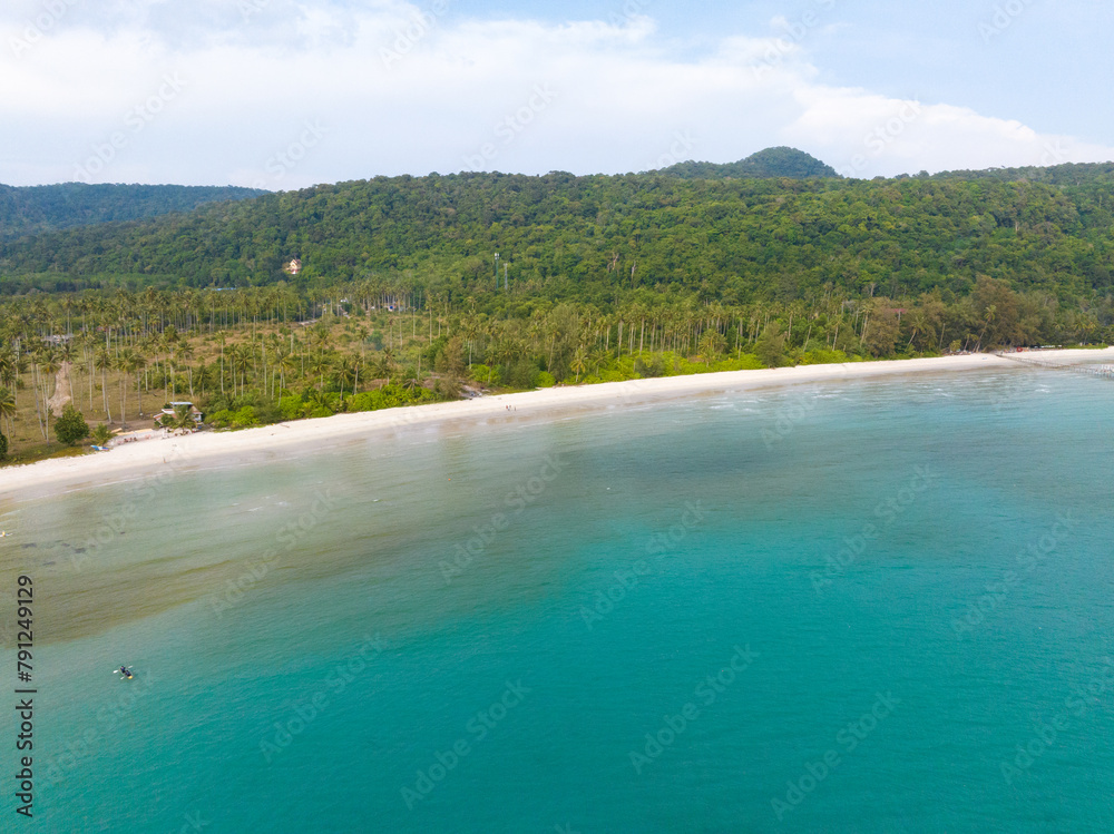Fototapeta premium Aerial drone view of beautiful beach with turquoise sea water and palm trees of Gulf of Thailand. Kood island, Thailand.