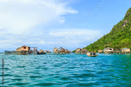 Beautiful landscapes view borneo sea gypsy water village in Bodgaya Mabul Island, Semporna Sabah, Malaysia. photo