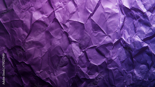 Deep purple crumpled paper texture with highlights and shadows.