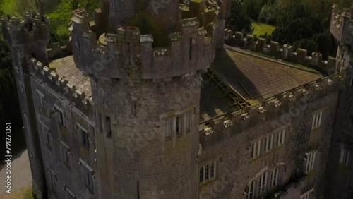 Aerial tilt of Charleville Castle featuring its details, ending on its tower. photo
