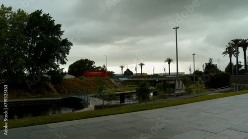 Wallpaper Mural People Walking At The Quays, Riverside Park Along The Taylor River On Overcast Day In Blenheim, New Zealand. - timelapse Torontodigital.ca