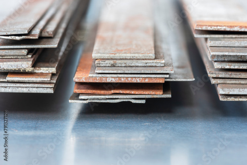 Stack of rusty steel flat bar, metallurgy industry