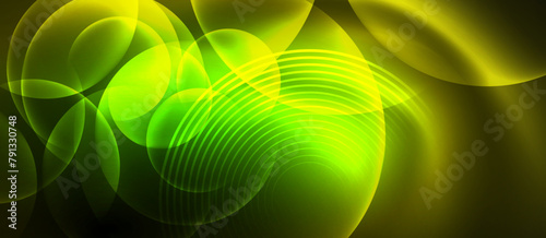 Macro photography of electric blue glowing circles resembling fractal art on a dark background. The symmetry and pattern reminds of water droplets on terrestrial plant grass from a closeup view