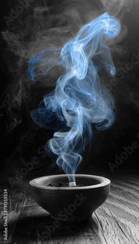 Blue smoke rising gracefully from a silver censer on a dark, mystical background