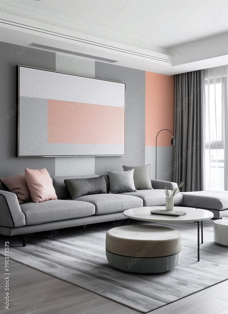living room with a grey couch and a pink wall living room with a grey couch and a pink wall