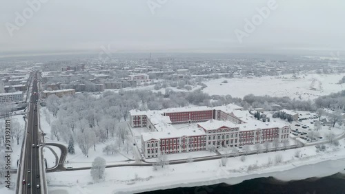 Red castle in winter. Revealing shoot. Latvia, Jelgava photo