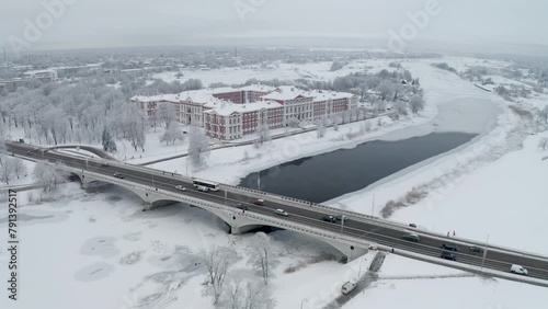 Revealing shoot. Bridge and frozen water revealing a scenery. Latvia - Jelgava photo