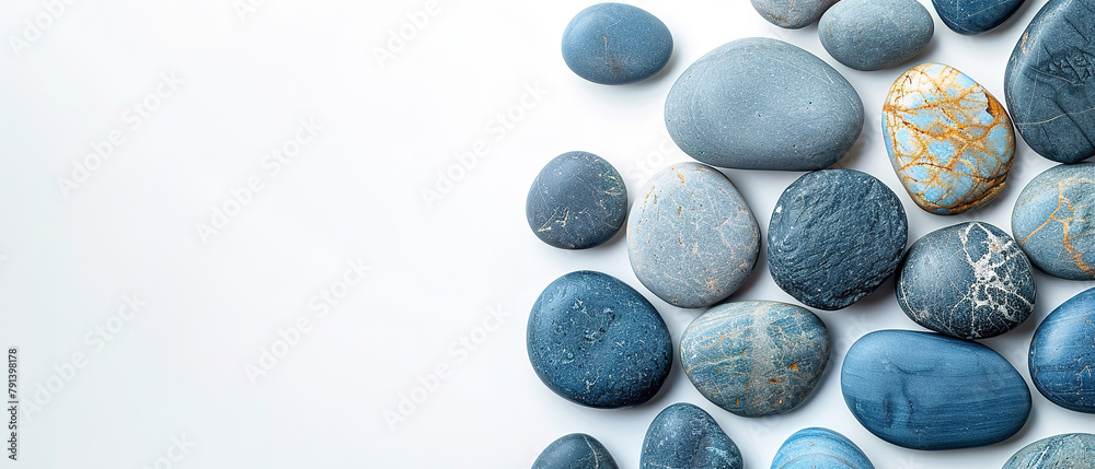 Flat lay composition with spa stones and space for text on white background., with empty copy space Flat lay composition with spa stones and space for text on white background., with empty copy space