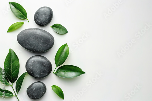 Flat lay composition with spa stones and space for text on white background.  with empty copy space