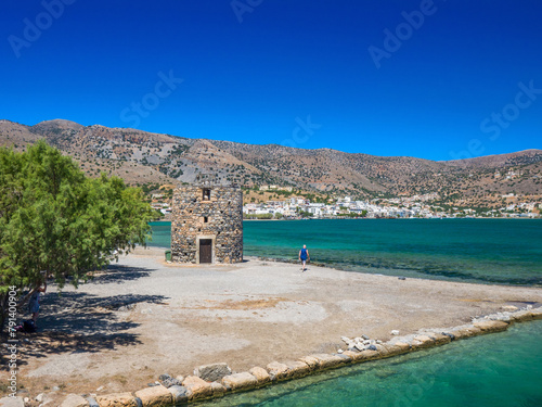 Ruin of old windmills in the coast (Elounda, Crete, Greece) photo