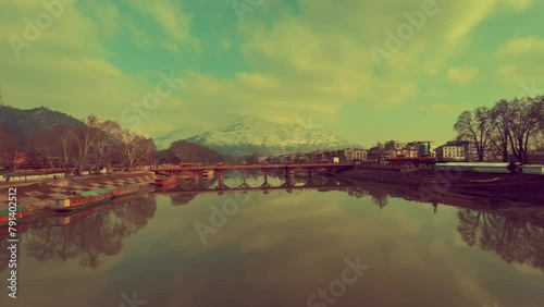 The Jhelum river of Kashmir looks beautiful, with fresh water and nice tourists destination photo