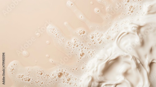 Skincare cleanser or shampoo foam texture. Copy space and soap bubbles on beige background. top view