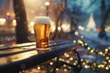 Glass of beer on the table in the city with bokeh background