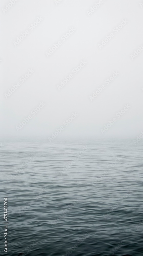 Serene Misty Lake Horizon, A Tranquil Natural Landscape Serene Misty Lake Horizon, A Tranquil Natural Landscape