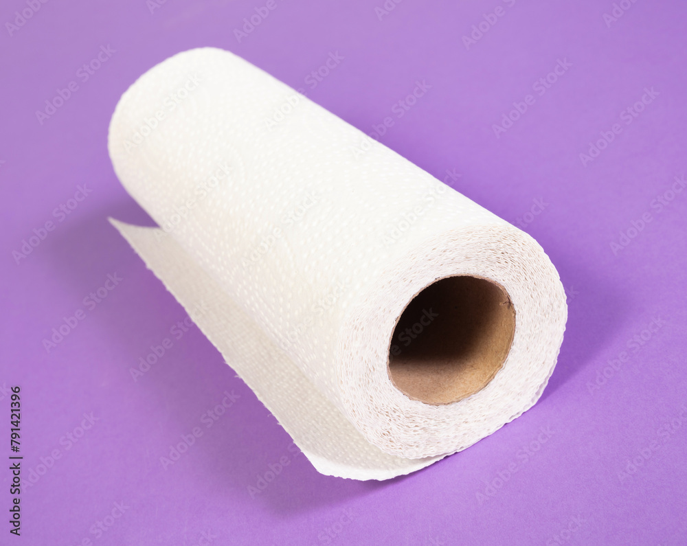 White kitchen paper isolated on purple background