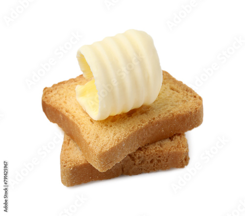Tasty butter curl and pieces of dry bread isolated on white