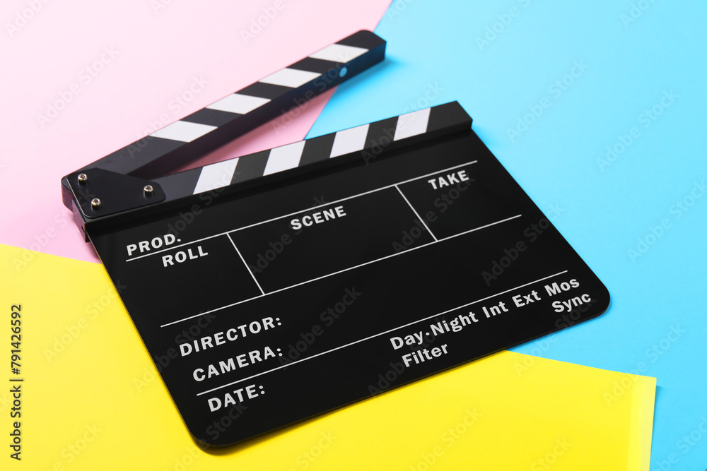 Clapperboard on color background, closeup. Film industry