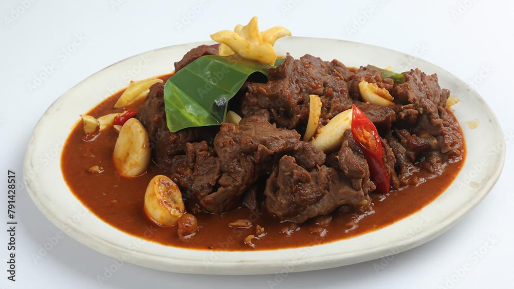 Beef Rendang or Nasi Rendang Sapi on white background Beef Rendang or Nasi Rendang Sapi on white background