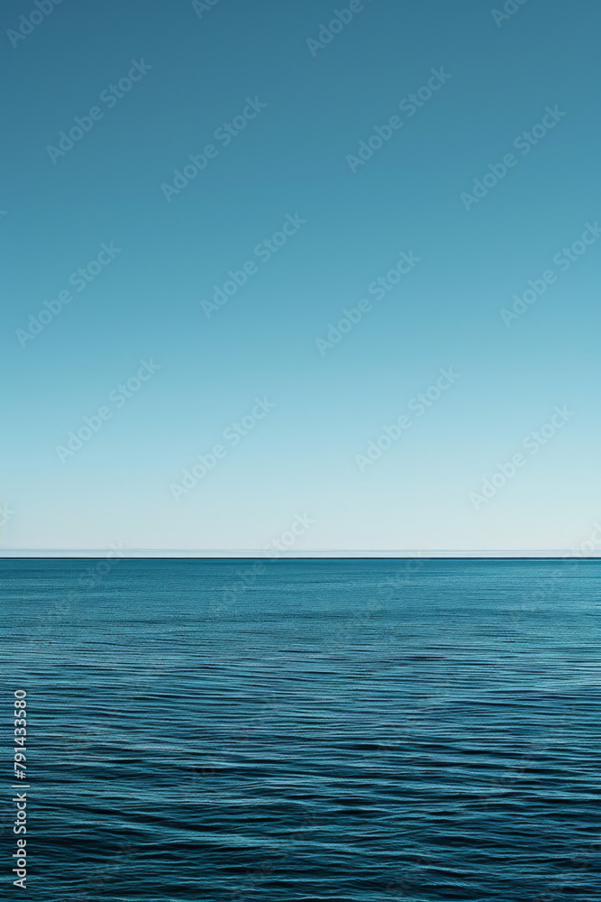The vastness of the ocean stretching out to the horizon, with just the line where the sea meets the sky in the frame. The vastness of the ocean stretching out to the horizon, with just the line where the sea meets the sky in the frame.