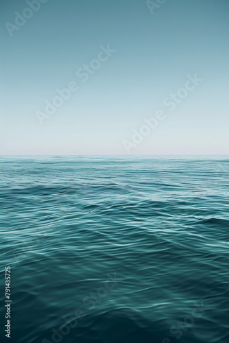 The vastness of the ocean stretching out to the horizon, with just the line where the sea meets the sky in the frame.