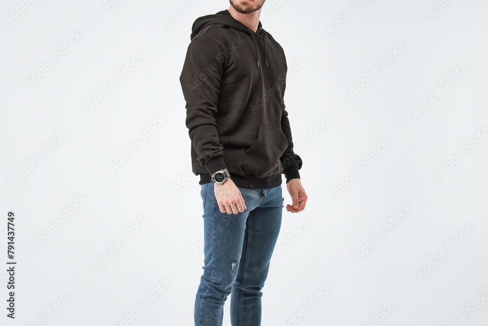 Horizontal studio photo empty hoodie sweater mockup. brand and logo design template of the young bearded man wearing daily apparel. Blank shirt with hood.