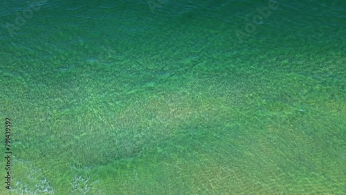 A chilling drone shot of sharks just off the coast in Palm Beach County South Florida! photo