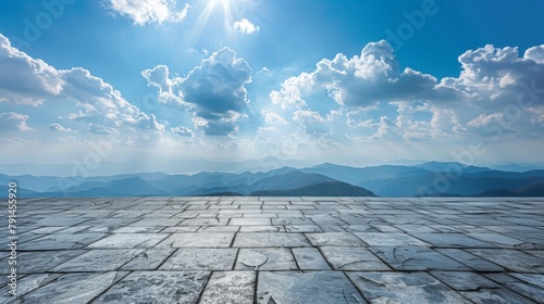 Stone floor with sky and distant mountains photo