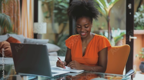 Woman Writing Notes at Desk