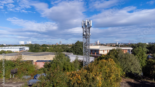Aerial photo of a mobile telephone communications tower in the village of Hunslet in Leeds West Yorkshire in the UK