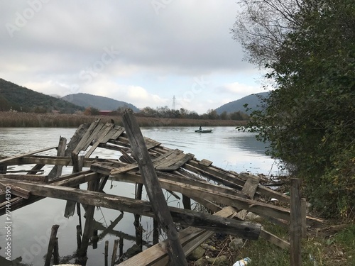 wooden bridge over river © tamer