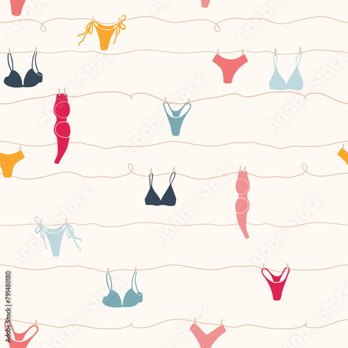 Cute seamless pattern with underwear hanging on a string. Swimsuit, bikini, panties, bra in summer day. Summer time vacation and travel aesthetic. Groovy and fun vector tropical background