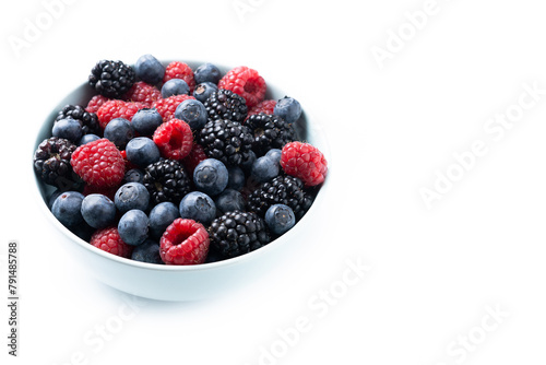 Fresh assortment berries isolated on white background. Copy space