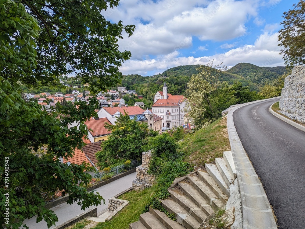 Beautiful cityscape scenery of buildings and architecture in old town surrounded by forest and hills at Krapina, Croatia, County Hrvatsko zagorje