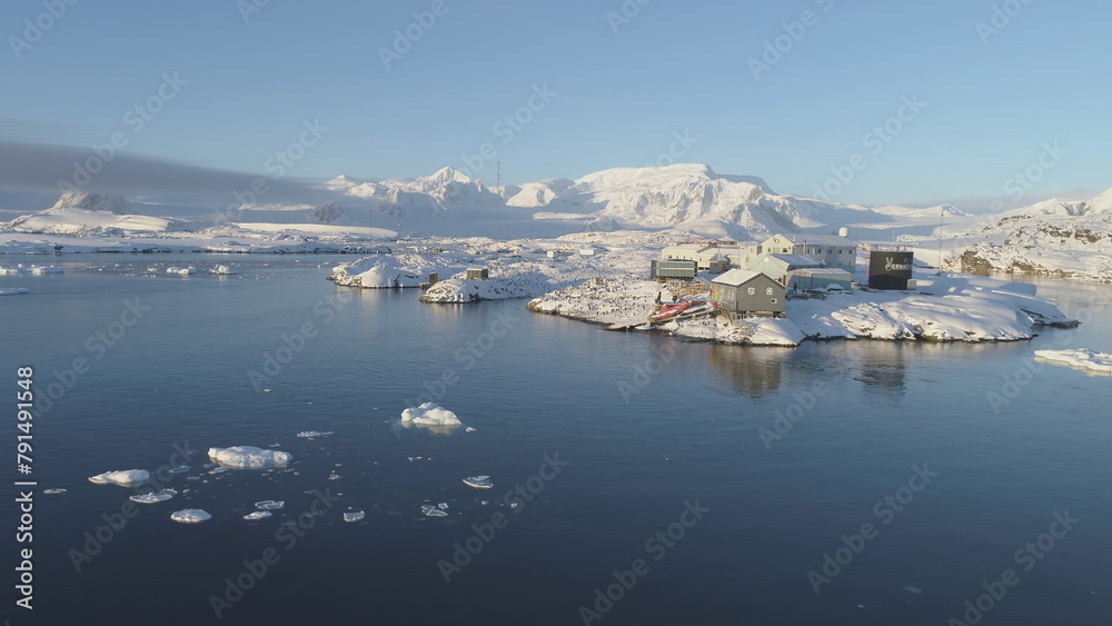 Polar Antarctic Vernadsky Station Aerial View. Ocean Coast Open Water Surface. South Pole Settlement Base Landscape Drone Flight