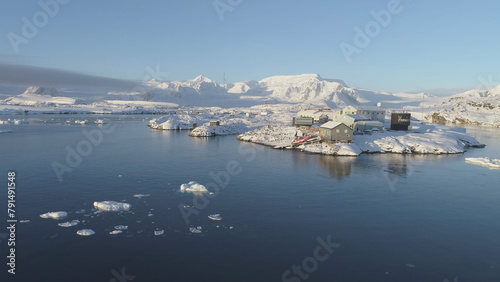 Polar Antarctic Vernadsky Station Aerial View. Ocean Coast Open Water Surface. South Pole Settlement Base Landscape Drone Flight