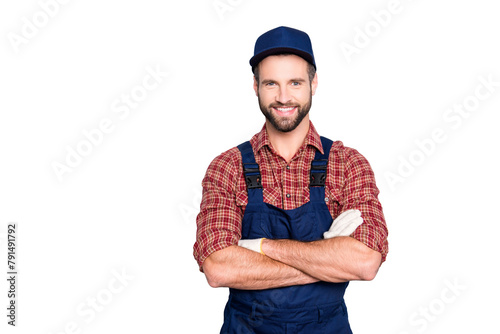 Portrait of handsome mechanic with stubble in blue overall, shirt having his arms crossed, looking at camera, isolated on grey background photo