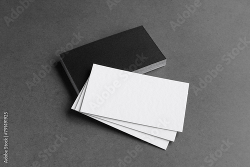 Business card on black background. Copy space for text.