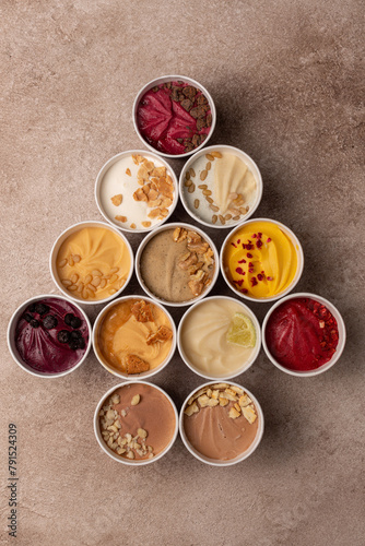 Assorted craft natural ice cream in paper buckets, Christmas, New Year concept
