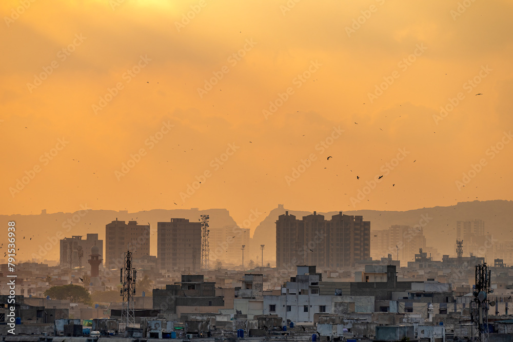 Aerial Sunset view of Karachi City. Karachi. Building and landmark