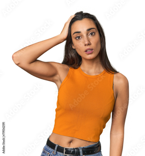 Hispanic young woman being shocked, she has remembered important meeting.
