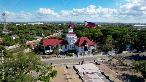 Kawit, Cavite, Philippines - Aerial flyby of Emilio Aguinaldo Shrine and the Philippine Flag.