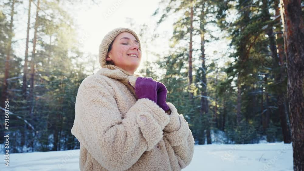 Portrait shot of young beautiful woman in snowy forest on winter day Portrait shot of young beautiful woman in snowy forest on winter day