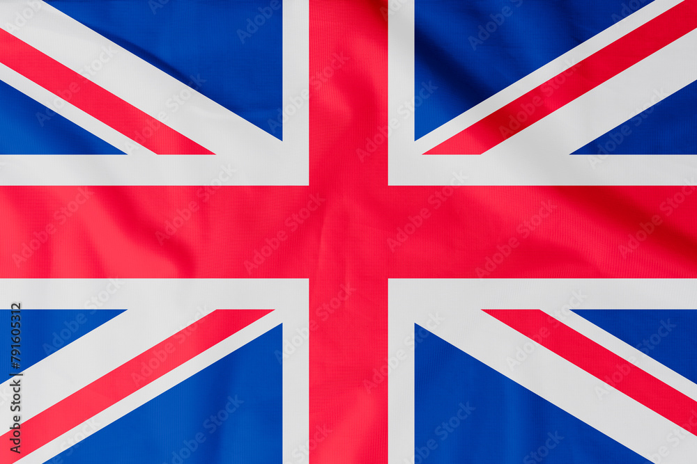 Flag of United Kingdom of Great Britain and Northern Ireland (UK) with natural material creases as a background