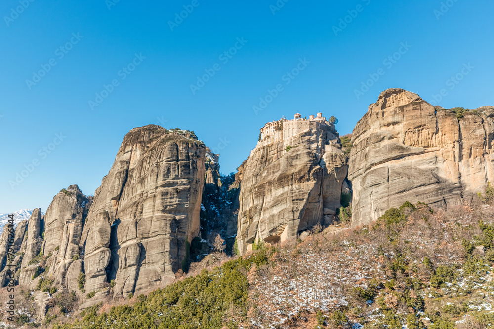 Panoramic view of Meteora monastery on the high rock in winter time, Greece. Panoramic view of Meteora monastery on the high rock in winter time, Greece.
