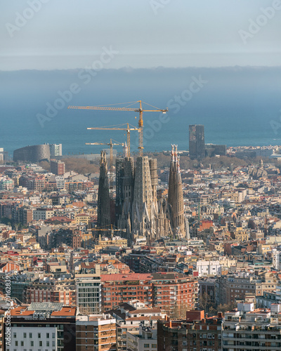 Aerial panoramic view of Barcelona city skyline and Sagrada familia in Spain.