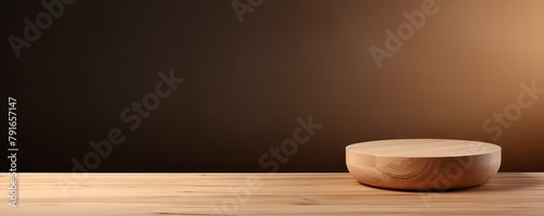 Abstract background with a dark beige wall and wooden table top for product presentation, wood floor, minimal concept, low key studio shot